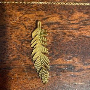 10k yellow gold feather charm on a 10K yellow gold 18” chain.Real authentic gold